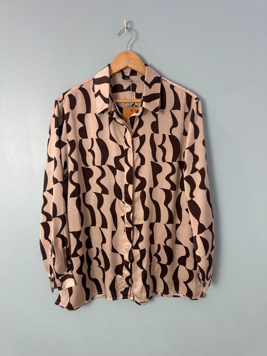 staple the label Button Through, 10