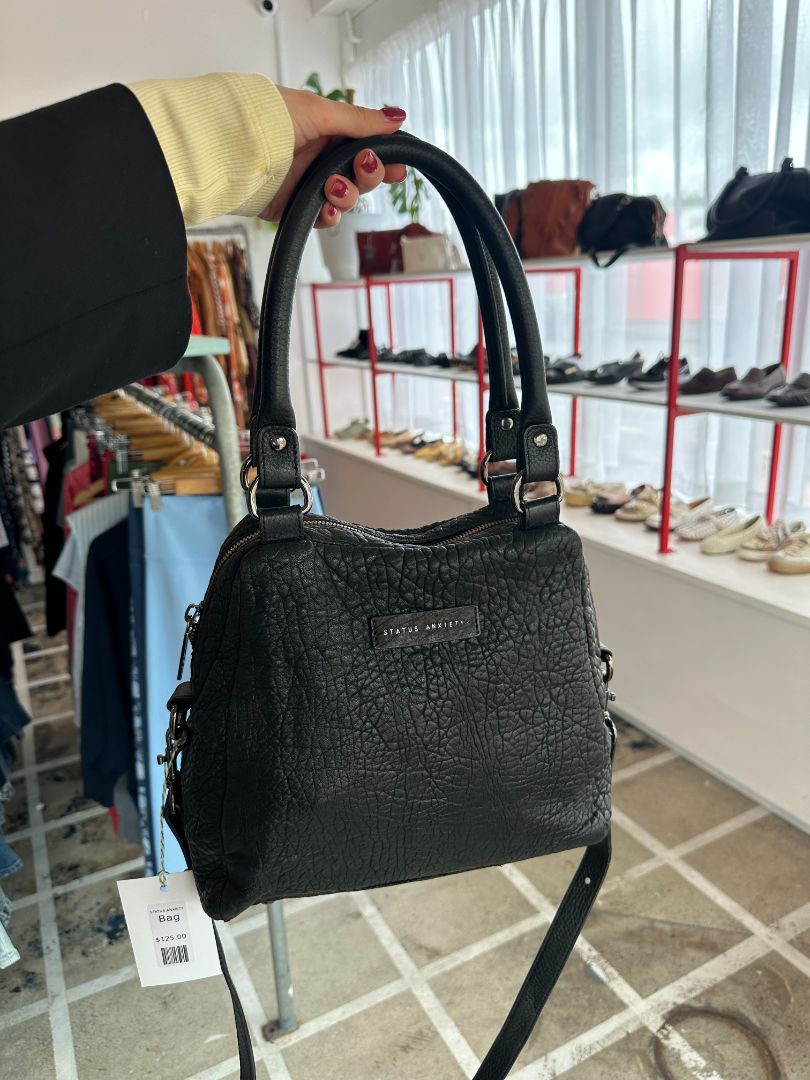 STATUS ANXIETY Bag